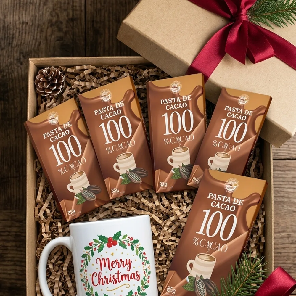 Caja de regalo con barras de pasta de cacao y una taza sublimada navideña